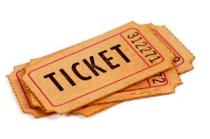 Vintage paper tickets stacked isolated on white background