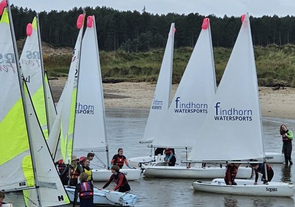 Sailboats on river at Findhorn Watersports event